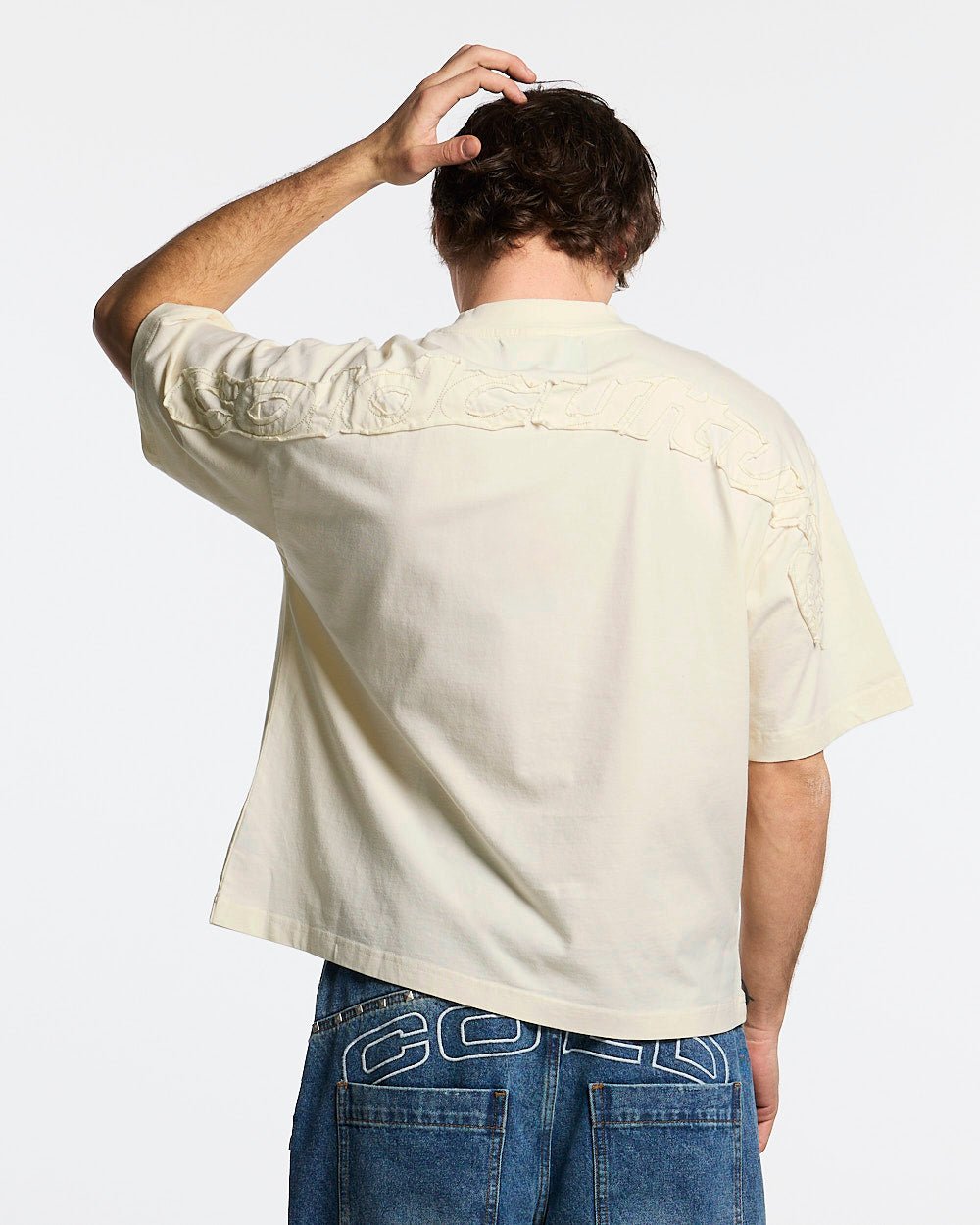 DISTRESS CURVED TEE CREAM